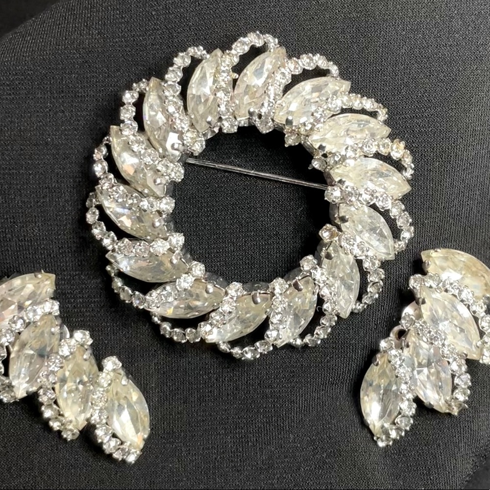 Vintage signed Weiss brooch & clip on earrings. Metal/ crystal rhinestone